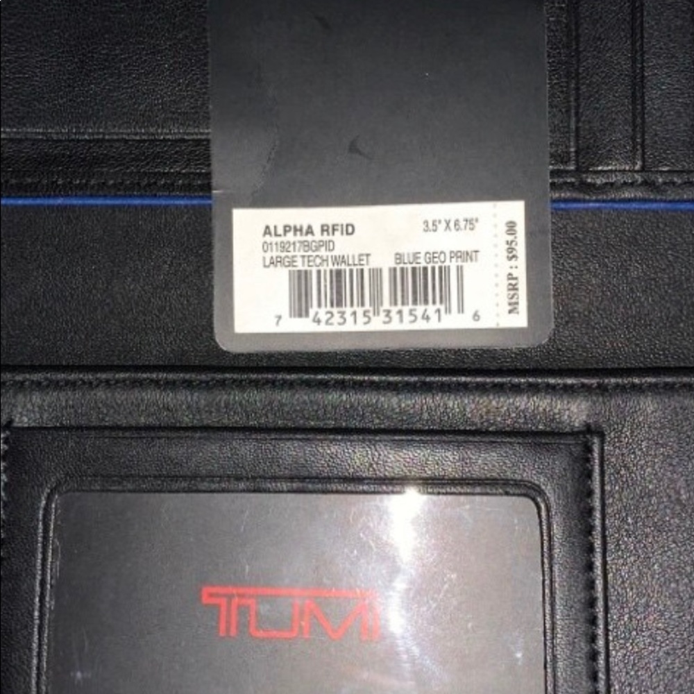 Tumi blue brand new wallet